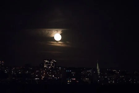 Moonrise over Paris from our apt.