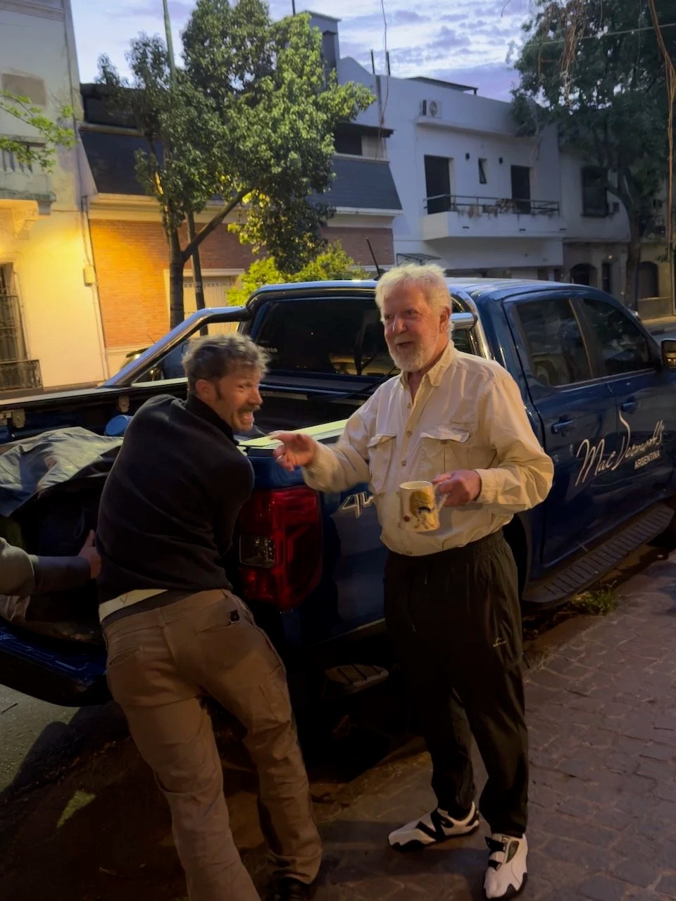  Rob and Hugh loading the truck 5:30 am, each demonstrating their usual roles 