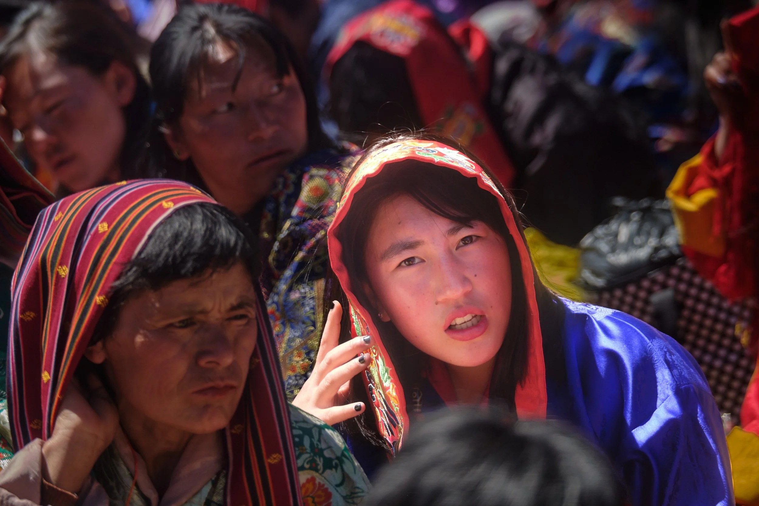 bhutan crowd with young woman.jpg